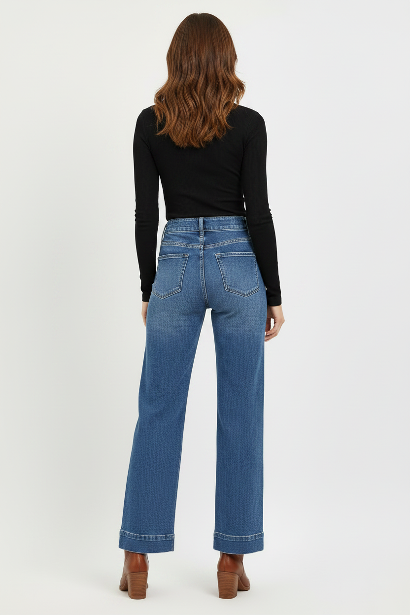 Wide leg jeans back view styled with black shirt and brown leather boots